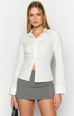 White fitted long sleeve shirt with an open collar V-neck and subtle front ruching