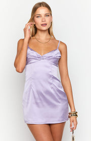 Lilac satin mini dress with a ruched sweetheart neckline and delicate spaghetti straps