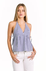 Deep V-neck blue and white striped halter top with a gathered bust and adjustable side tie details