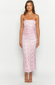 Front view of a pink floral print strapless maxi dress with a ruched bodice