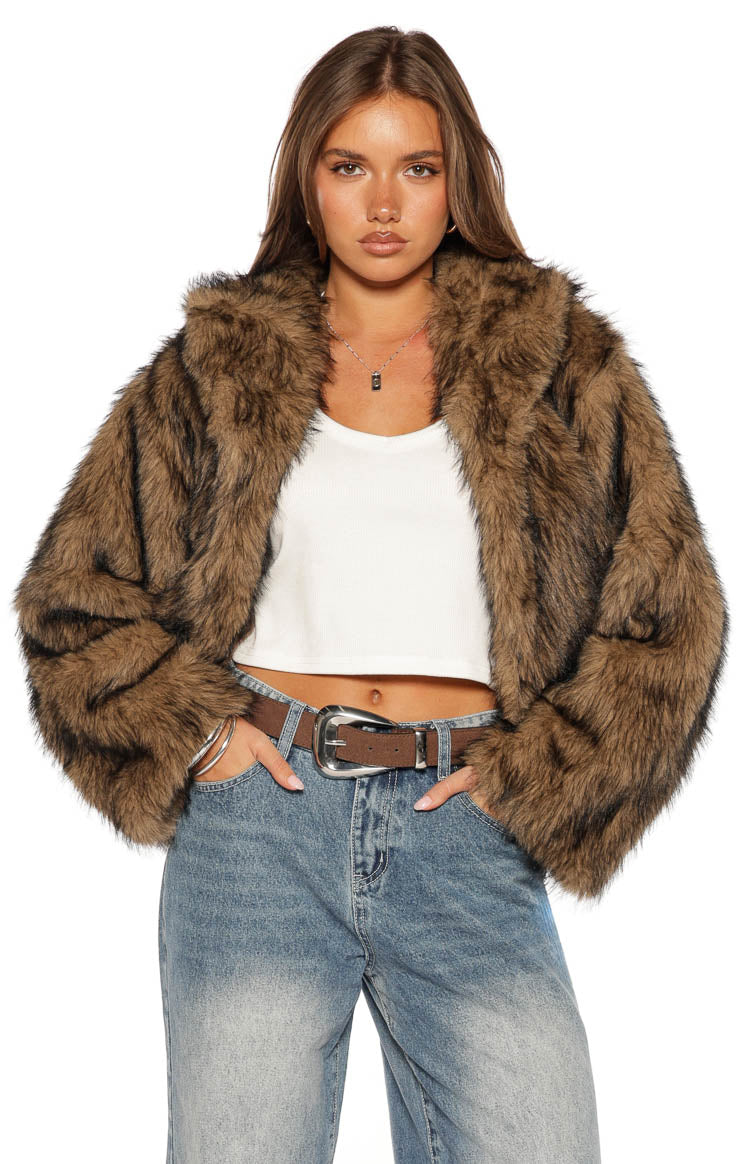 Cropped chocolate faux fur jacket with a distinct striped pattern, wide lapels, and full sleeves