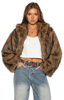 Beginning Boutique It Girl Chocolate Faux Fur Jacket chocolate brown faux fur jacket with wide lapels and long sleeves, cropped length