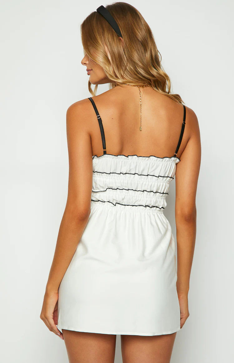 black mini dress with white bow in back QNNGXX Women's Backless Bow Tie Little Black Short Dress Summer Sexy Cocktail Dresses Graduation Dress for Teens at Amazon Women's Clothing store