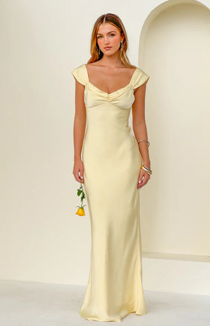 Beginning Boutique Jacky Yellow Satin Maxi Dress light yellow satin maxi dress with a sweetheart neckline, ruched bust, and short cap sleeves