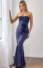 Navy strapless maxi dress with a sweetheart neckline, sequin body, and plain navy bust and mermaid flare skirt