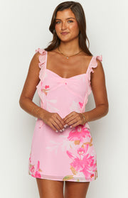 Pink floral chiffon mini dress with a gathered sweetheart neckline and ruffled shoulder straps