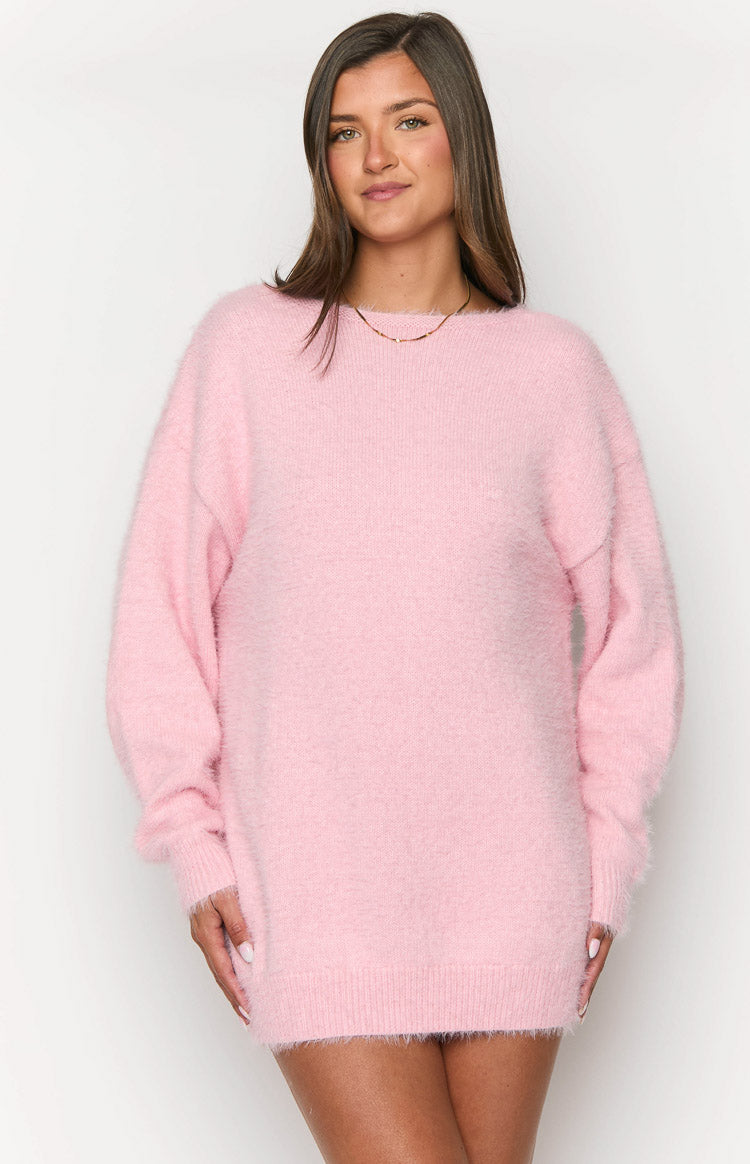 Pink fluffy knit mini dress featuring a round neckline, long sleeves, ribbed cuffs, and hem