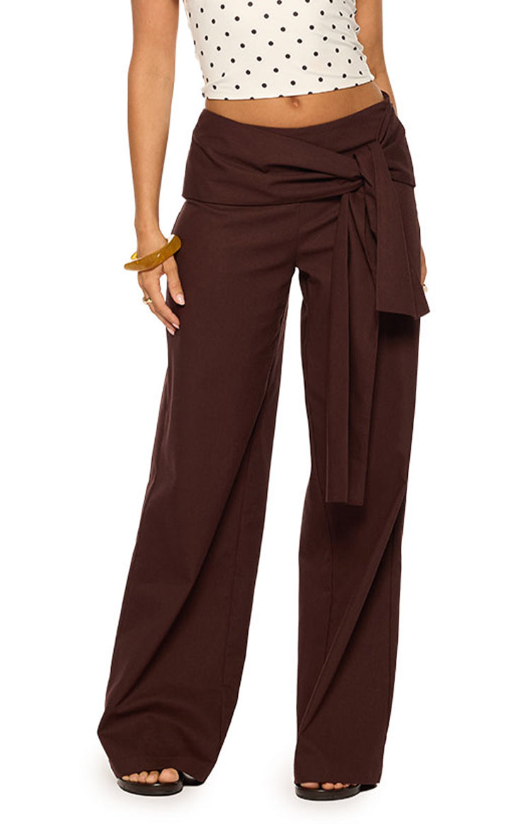 Front view of brown linen wide-leg pants with a wrap-style tie-front waist