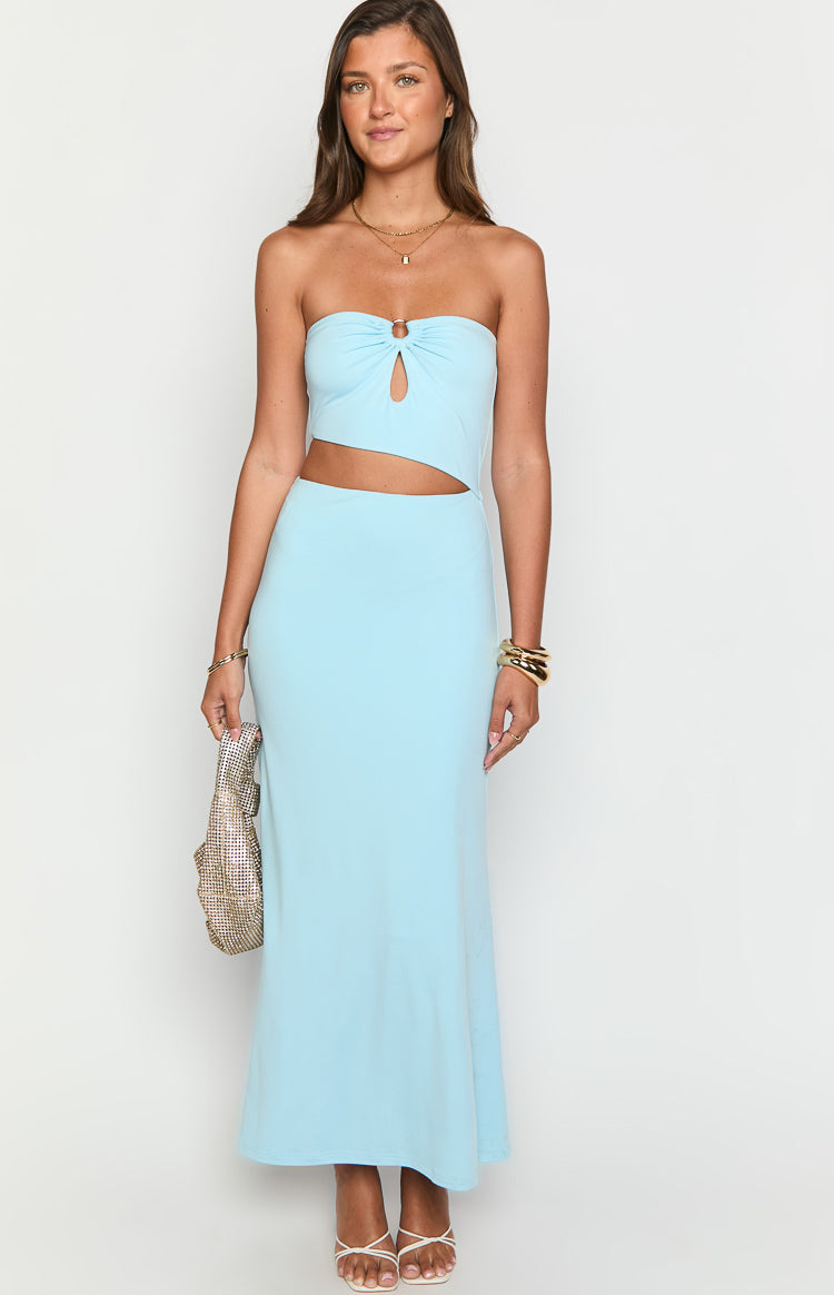 Light blue strapless maxi dress with a gathered bust, keyhole cutout with gold ring, and side waist cutouts