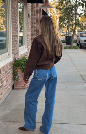 Kansis Mid Wash Scallop Pockets Uneven Waist Jeans