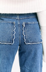 Kansis Mid Wash Scallop Pockets Uneven Waist Jeans Image