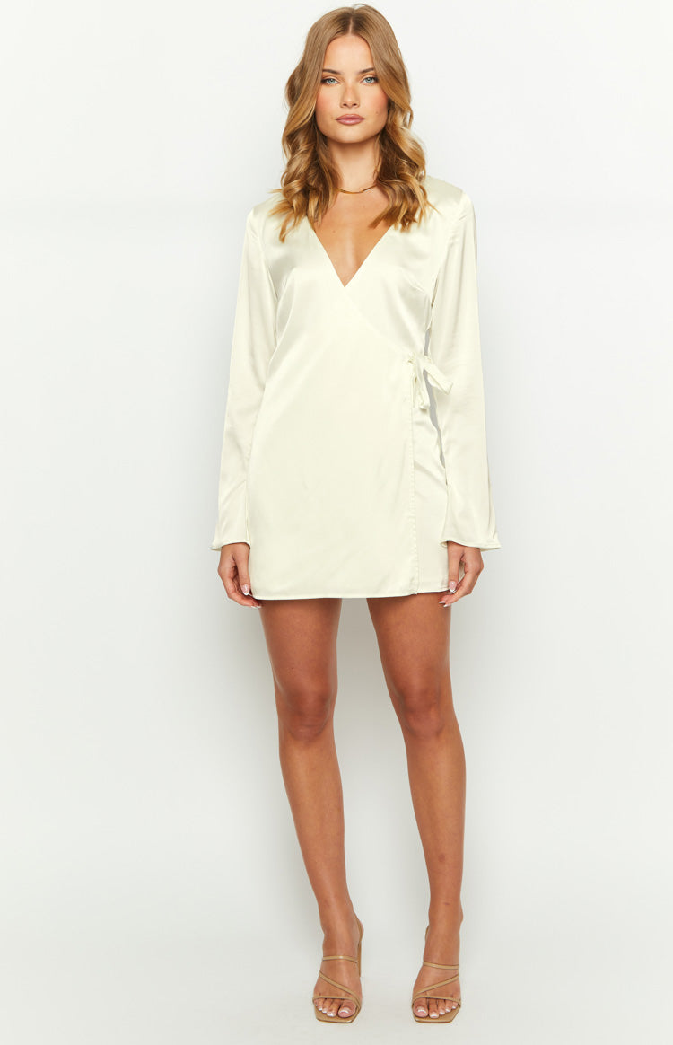 Cream satin long sleeve mini dress with a V-neck and side tie wrap detail
