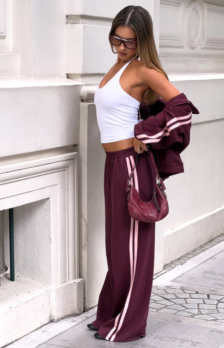 Beginning Boutique Kosie Burgundy and Pink Stripe Track Pants burgundy wide-leg track pants with double pink side stripes