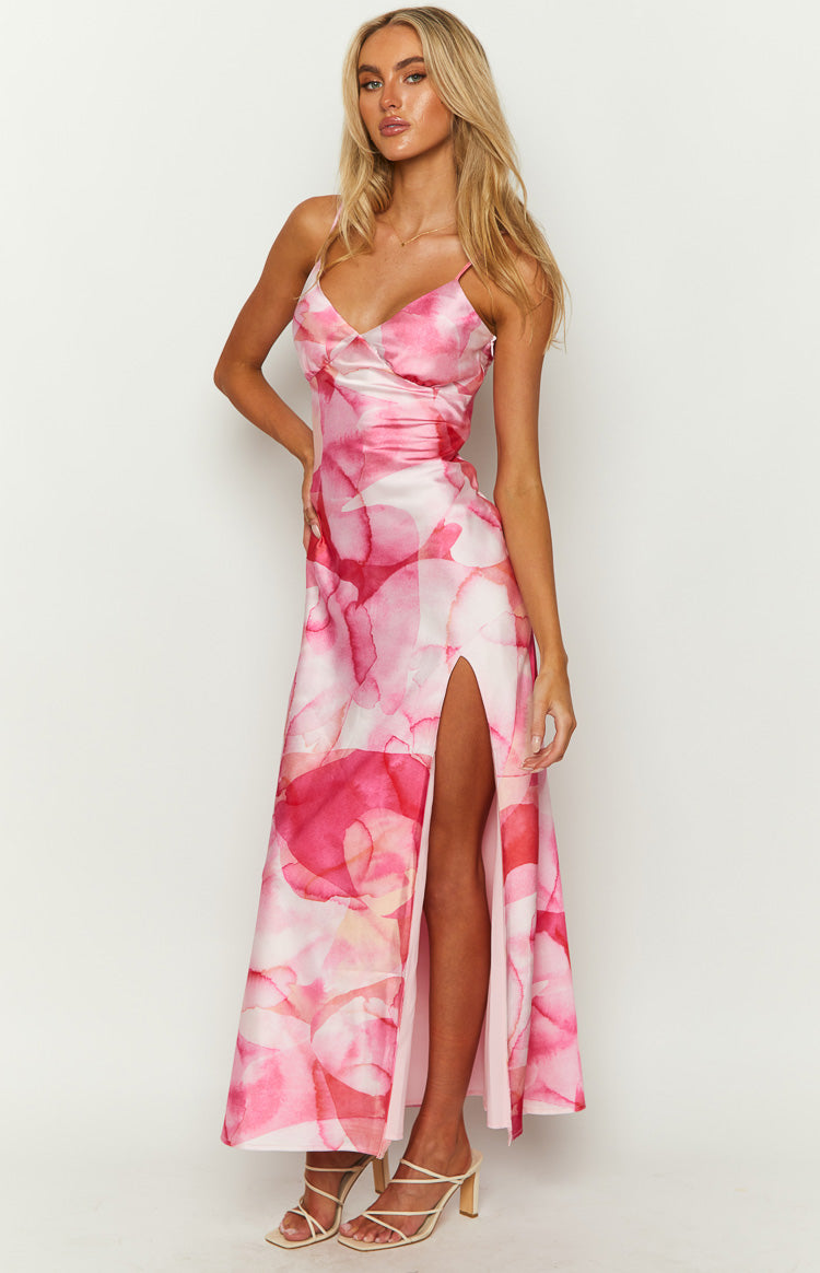 Pink satin print maxi dress with a cowl neck, spaghetti straps, and a high side slit