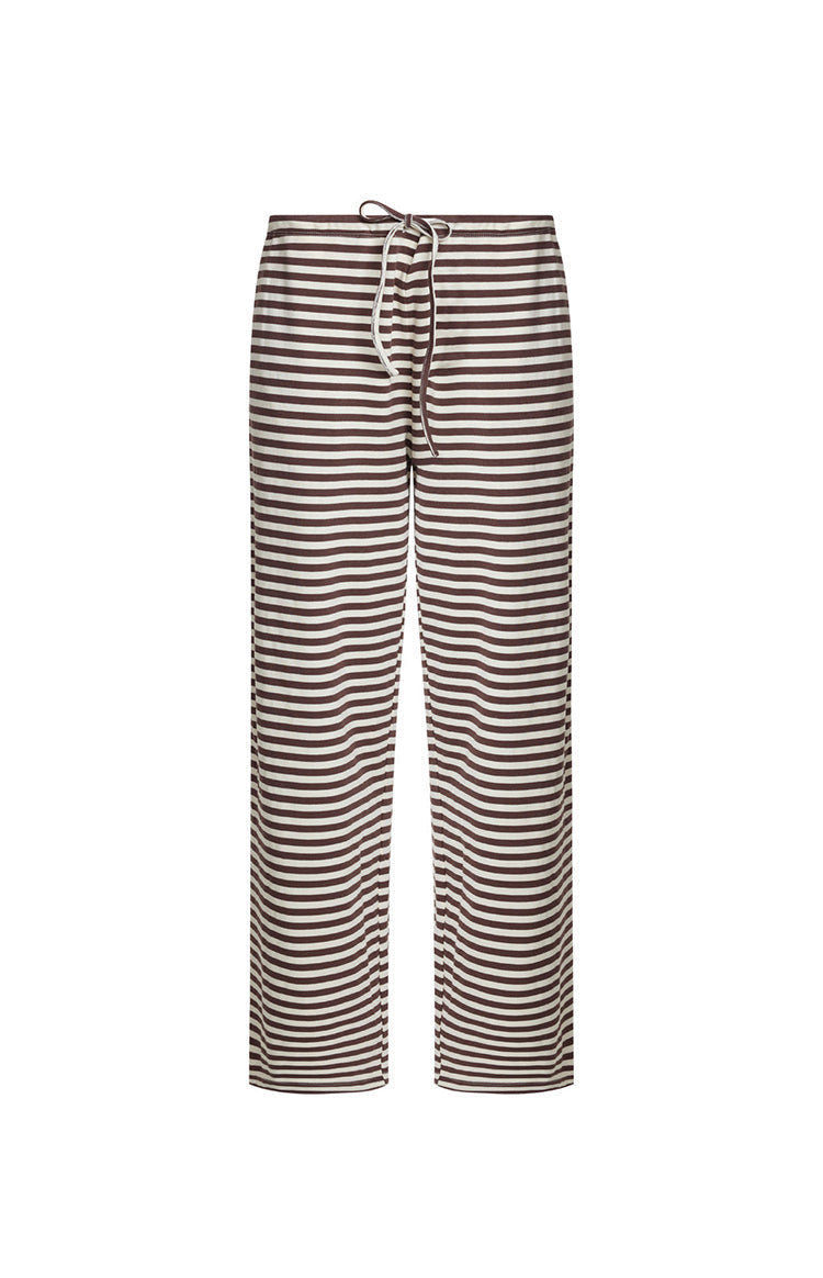 Our product shot of a pair of lounge pants featuring a horizontal stripe pattern with alternating white and dark brown stripes. This pants have a relaxed straight fit cut to a full length and are finished with an elasticized waistband and a thin white drawstring tie.