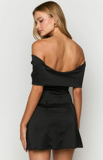 Rear view of a black satin off-shoulder mini dress with a low scoop back
