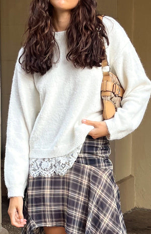 Beginning Boutique Lolly Cream Lace Trim Knit cream fuzzy knit sweater with round neck, long sleeves, and lace trim hem