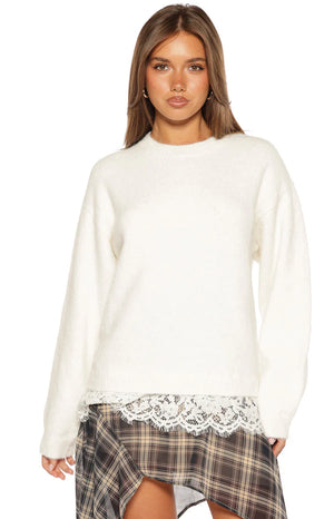 Beginning Boutique Lolly Cream Lace Trim Knit cream fuzzy knit long sleeve sweater with white lace trim at the hem