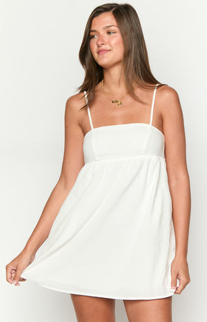 Beginning Boutique Lotus Love Affair White Mini Dress white babydoll mini dress with a square neckline and thin spaghetti straps