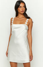 White satin mini dress with a square neckline and delicate floral applique straps