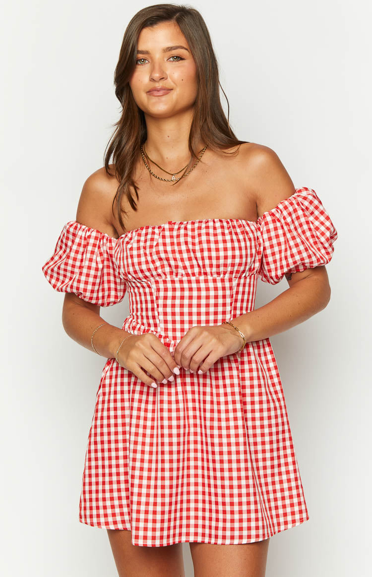 Front view of a red and white gingham mini dress with off-the-shoulder puff sleeves and a corset-style bodice