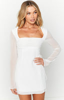 Beginning Boutique Lucy White Long Sleeve Mini Dress white square neck mini dress with sheer long sleeves and a wrap tie skirt