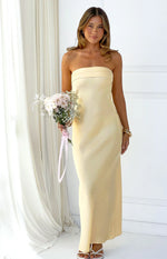 Front view of a yellow strapless maxi dress with a banded neckline and a straight, fitted silhouette