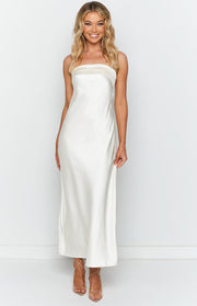 Front view of a white satin strapless maxi dress with a folded neckline detail