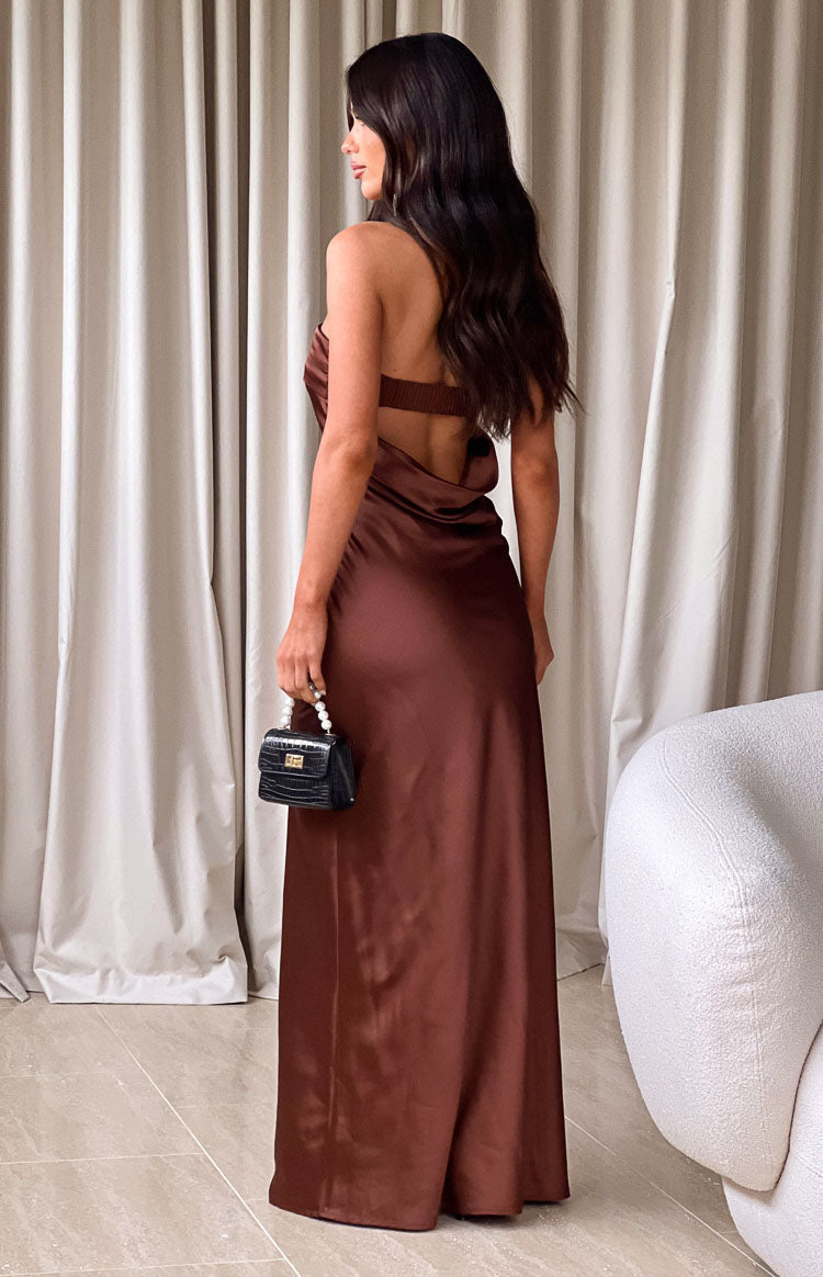 Rear view of a brown satin maxi dress with a low cowl back and ribbed upper back band