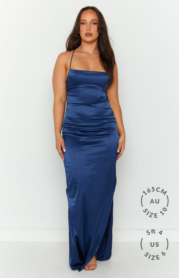 Navy satin maxi slip dress with a straight neckline and thin spaghetti straps, side leg slit