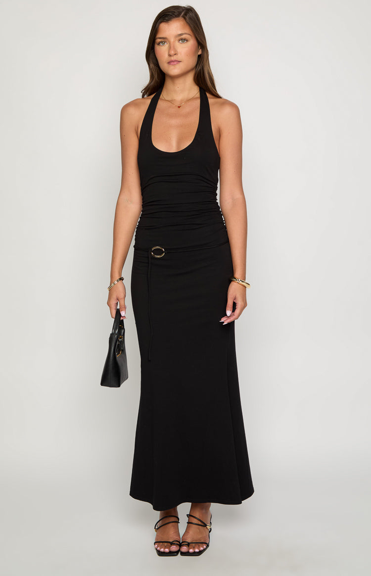 Front view of a black halter neck maxi dress with a ruched bodice and O-ring tie detail at the waist