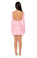 Rear view of a light pink sequin mini dress with a low open back and tie-up shoulder straps