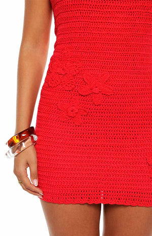 Model wears the Mazzy Red Strapless Crochet Mini Dress a stunning floral piece perfect for a summer festival or beach party.