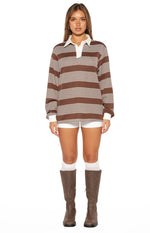 Relaxed fit brown and white striped long sleeve polo with a white collar and ribbed cuffs