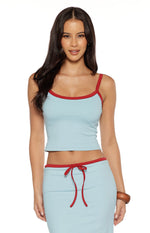 Light blue cropped tank top with a scoop neckline and red trim along the neckline and spaghetti straps