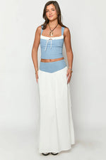 Beginning Boutique Mystic White Maxi Skirt white flowy maxi skirt with a wide blue contrast waistband