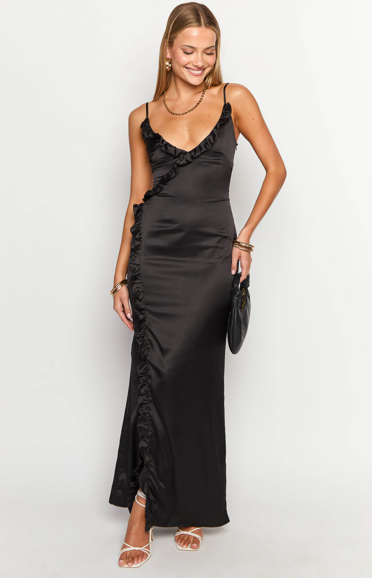 Front view of a black satin maxi dress with a ruffled V-neckline and a cascading ruffle detail down the side