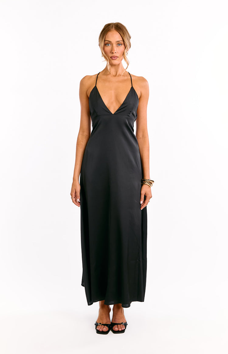 Black bias-cut satin maxi dress with a deep V-neckline and delicate spaghetti straps