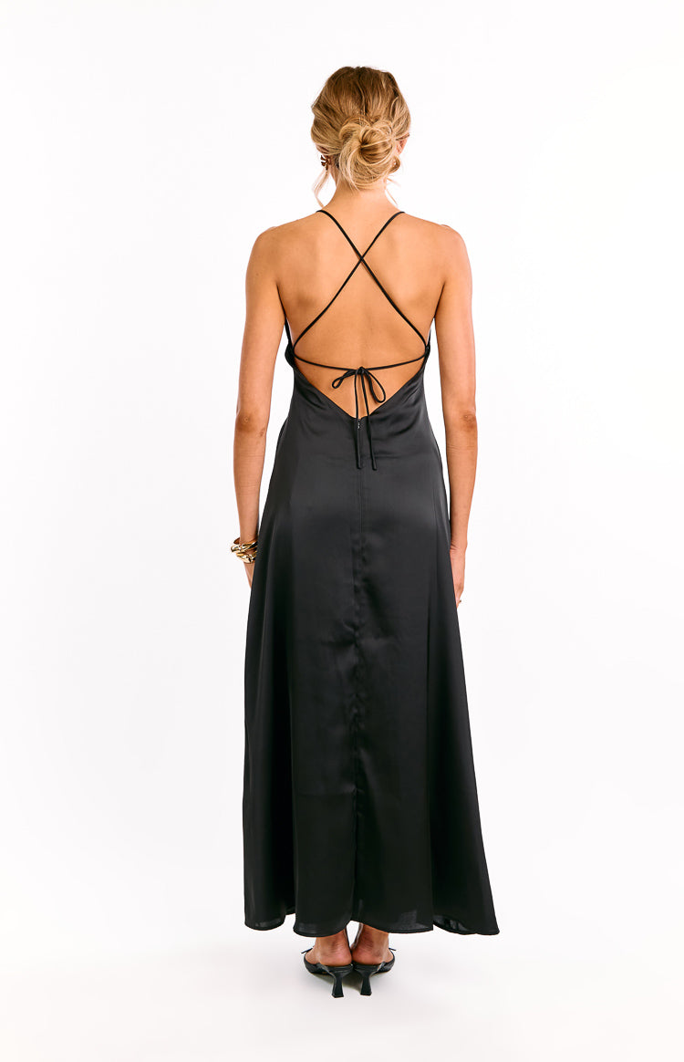Rear view of a black satin maxi dress with criss-cross spaghetti straps and a tie-back detail