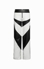 Rear view of white and black PU pants with a chevron pattern and exposed black back zipper