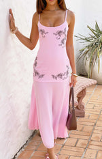 Light pink midi dress with dark floral embroidery on the scoop neck bodice and upper skirt