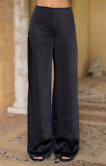 Full length front view of black satin straight leg pants with a smooth flat waistband