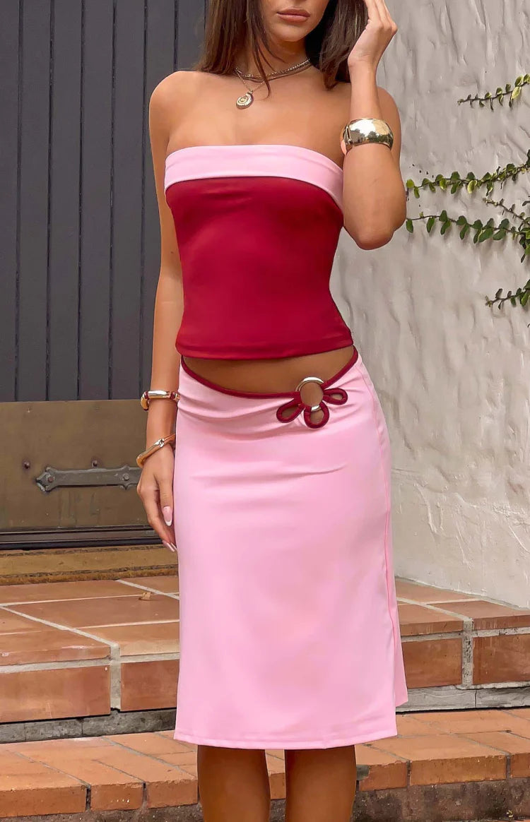 Beginning Boutique Orlanda Pink Contrast Bind Midi Skirt light pink midi skirt with dark pink contrast bind, flower cutout, a