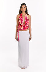 Front view of a yellow orchid print cowl neck tie top with a deep V-neck and side tie detail
