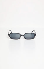 Front view of black rectangle sunglasses with dark lenses and arms slightly open
