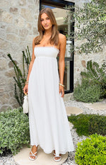Close-up of the white satin maxi dress showing the delicate lace trim along the straight neckline and thin spaghetti straps
