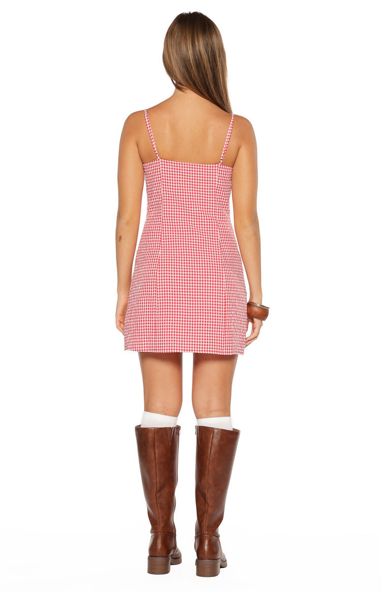 Rear view of the red gingham mini dress with thin spaghetti straps and a square back neckline