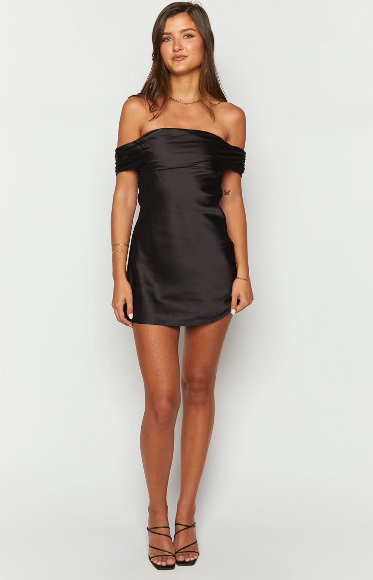 Front view of the black satin off-shoulder mini dress, highlighting the draped neckline and fitted body