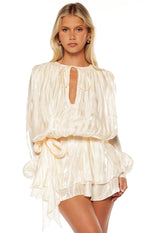 Pearl satin long sleeve mini dress with keyhole tie neckline, blouson bodice, and ruffled skirt