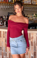 Beginning Boutique Ria Light Wash Denim Mini Skirt light wash denim high-waisted mini skirt with double button closure